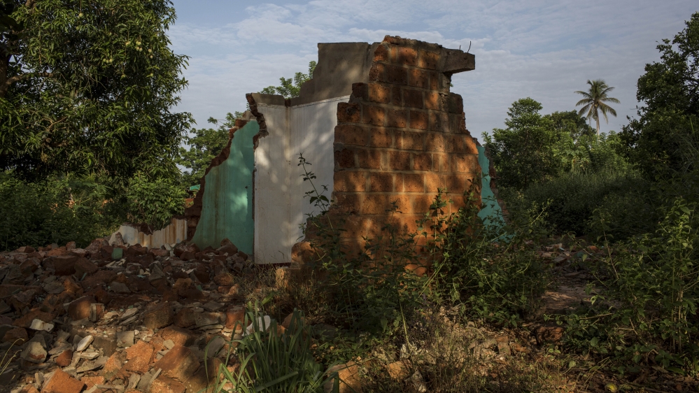 The ruins of a Muslim home that was destroyed in 2017 by members of the predominantly Christian Anti-Balaka militia is seen in the Tokoyo neighbourhood of Bangassou [Will Baxter/Al Jazeera]