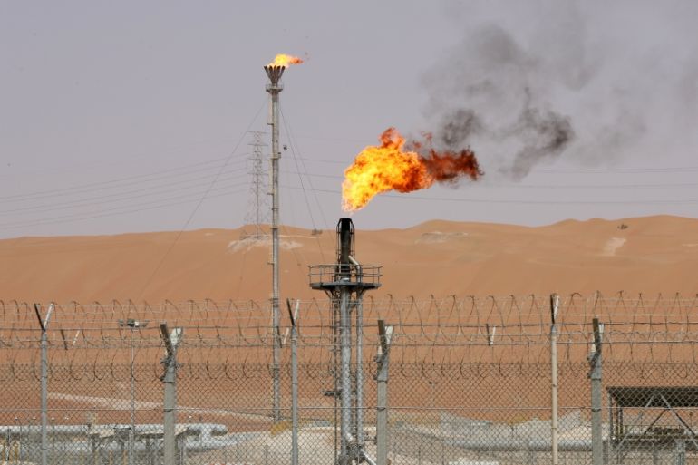 Flames are seen at the production facility of Saudi Aramco''s Shaybah oilfield in the Empty Quarter