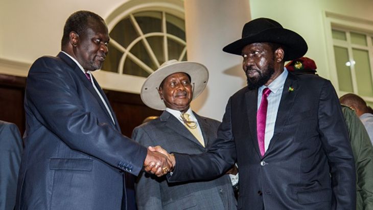 UGANDA-SSUDAN-CONFLICT-TALKS President of South Sudan, Salva Kiir (R) shakes hands with arch-rival South Sudan''s opposition leader Riek Machar (L)