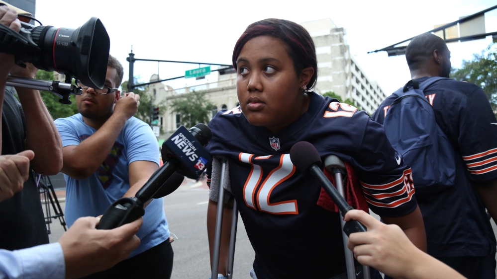 Poindexter injured her ankle while trying to escape [Joey Roulette/Reuters]