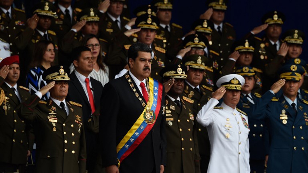 Maduro was attending a ceremony when the 'assassination attempt' took place [Juan Barreto/AFP]