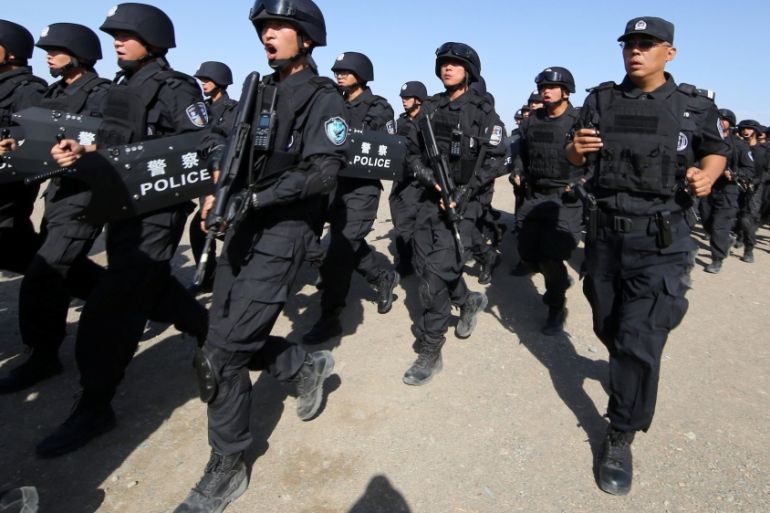 China Uighurs soldiers Reuters