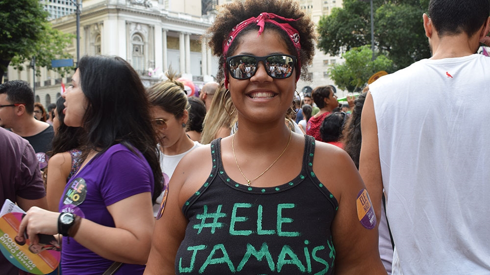 Priscila Almeida, pictured, said she would 'never' back Bolsonaro [David Child/Al Jazeera]