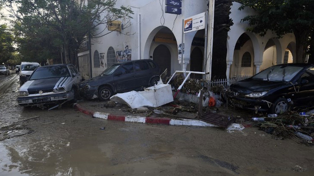Cars washed away in the Tunisian coastal town of Nabeul following deadly flash flooding [Fethi Belaid/AFP]