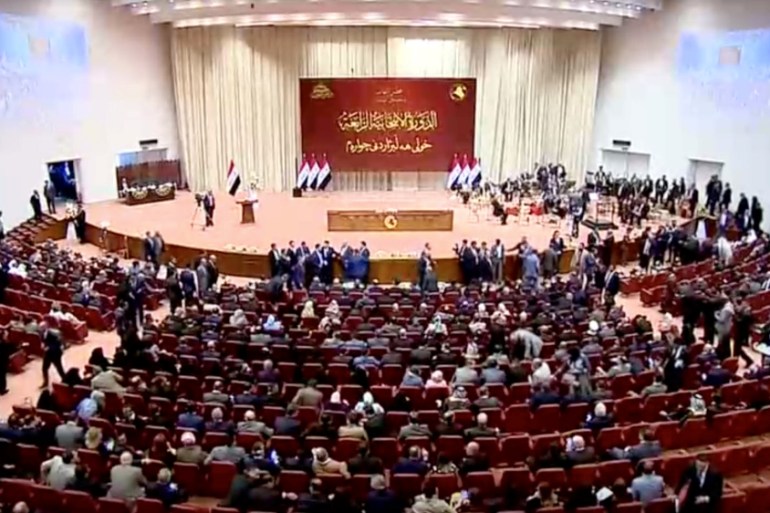 Iraqi lawmakers are seen before opening session of the new Iraqi parliament in Baghdad