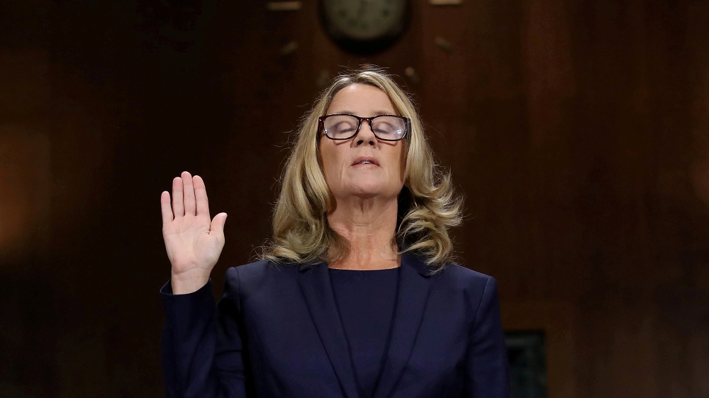 Christine Blasey Ford is sworn in before testifying to the Senate Judiciary Committee [Win McNamee/Reuters]
