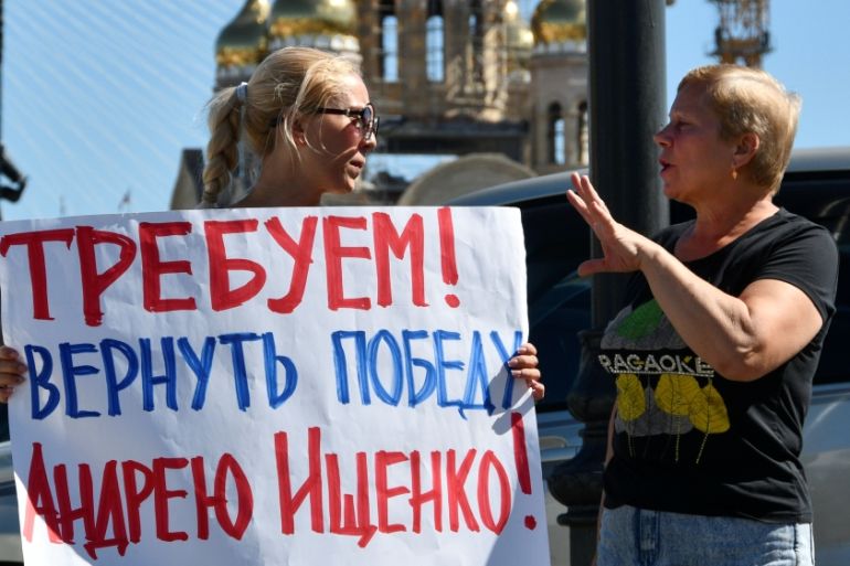 Supporters of candidate Ischenko protest in a street following the election for governor of Russia''s Primorsky Region in Vladivostok