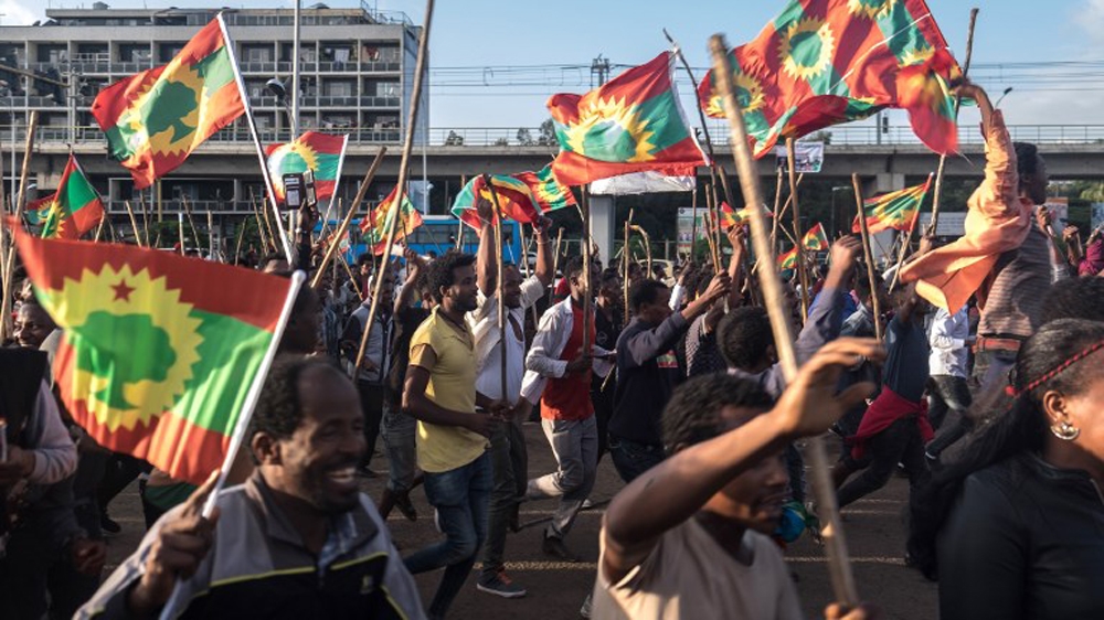 Thousands of Ethiopians hailed the return of the once-banned Oromo group on Saturday [AFP]