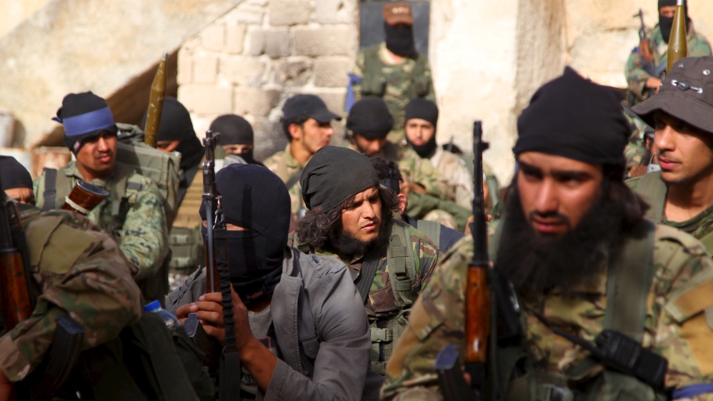 Members of al-Nusra Front gather before moving towards their positions during an offensive to take control of the northwestern city of Ariha in Idlib province on May 28, 2015 [Reuters]
