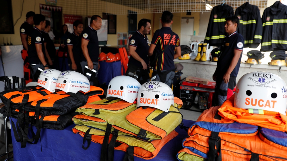 Rescuers in Manila ready their gear before Super Typhoon Mangkhut makes landfall [Reuters]