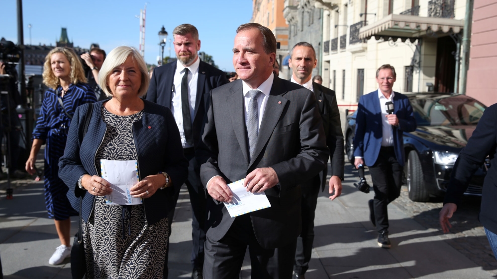 Social Democrats leader and incumbent Prime Minister Stefan Lofven (right) said the vote was a referendum on Sweden's welfare state [TT News Agency/Reuters]