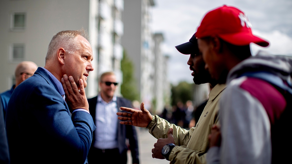 Swedish Left Party leader Jonas Sjostedt meets with voters during an election campaign visit [Adam Ihse/TT News Agency/via Reuters]