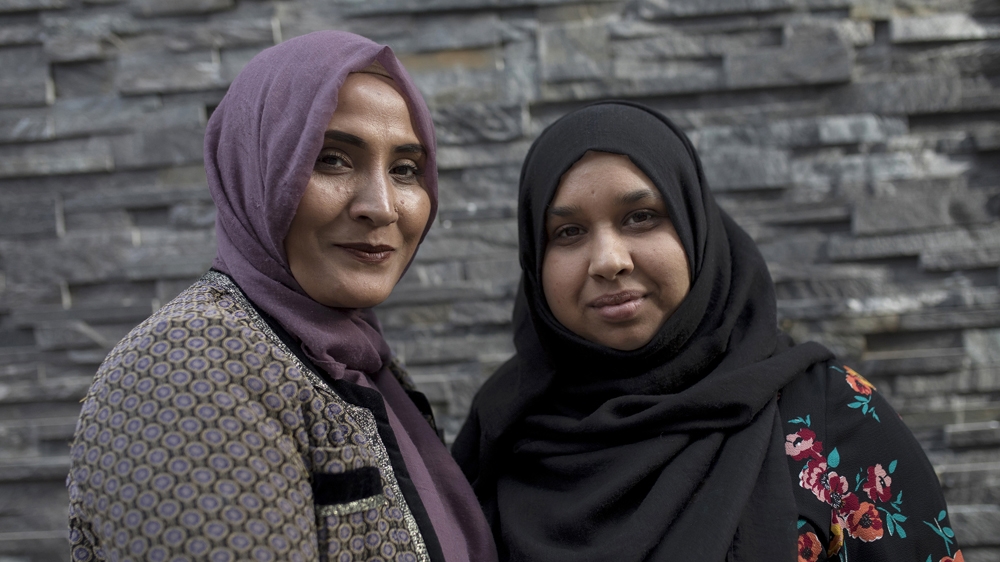 Jusna Begum, left, 43 and Tahera Ayazi, 42. Two of Eden Care's staff who performed Ghusl body-washing on the Grenfell fire victims [James Rippingale/Al Jazeera]