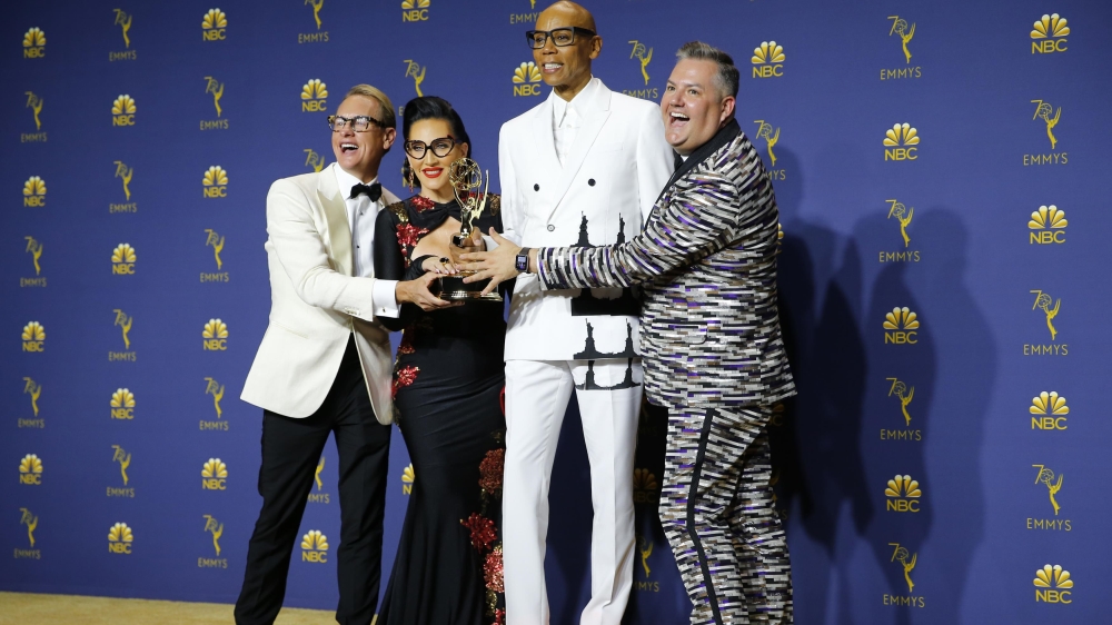 Carson Kressley, Michelle Visage, RuPaul and Ross Mathews pose backstage with the Reality-Competition Program award for RuPaul's Drag Race [Mike Blake/Reuters]