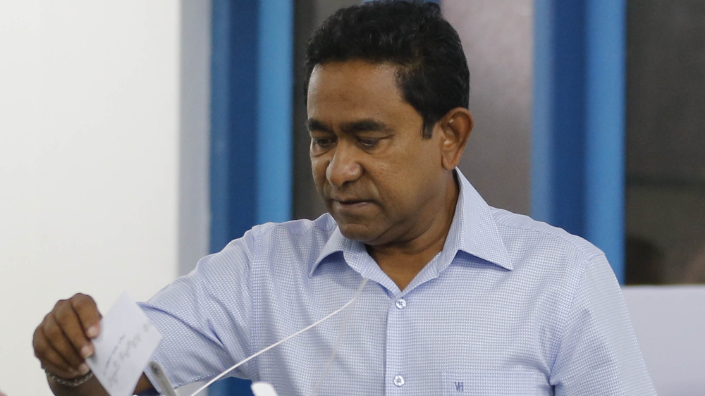 President Abdulla Yameen casts his vote at a polling station [Eranga Jayawardena/The Associated Press]
