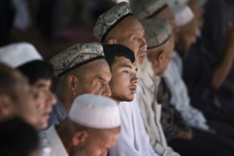 Uighur man pray