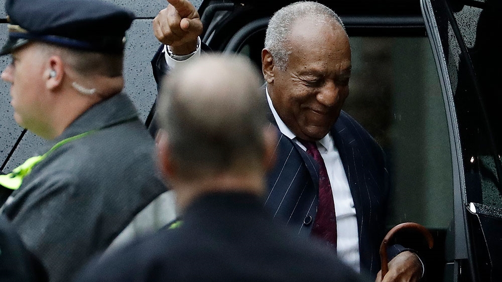 Bill Cosby gestures as he arrives for his sentencing hearing at the Montgomery County Courthouse on Tuesday [Matt Slocum/AP Photo]