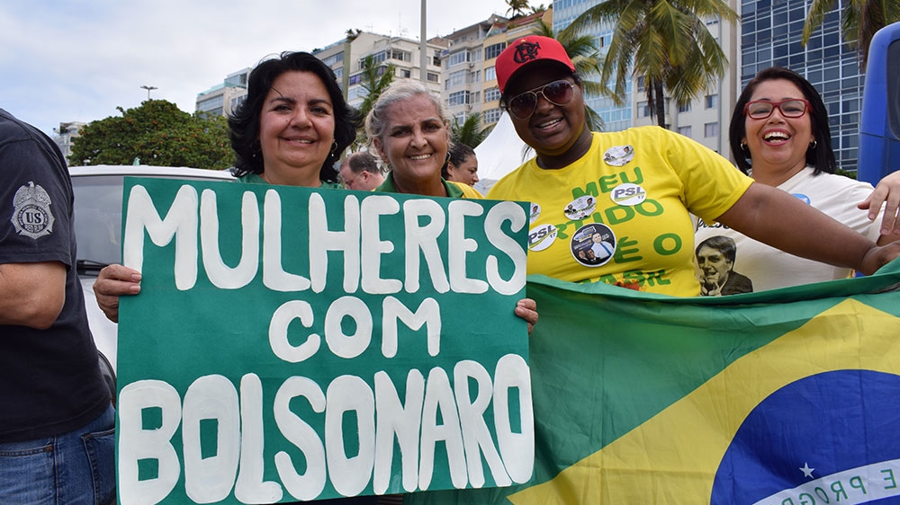 Hundreds of Bolsonaro supporters demonstrated on Rio's Copacabana beachfront [David Child/Al Jazeera]