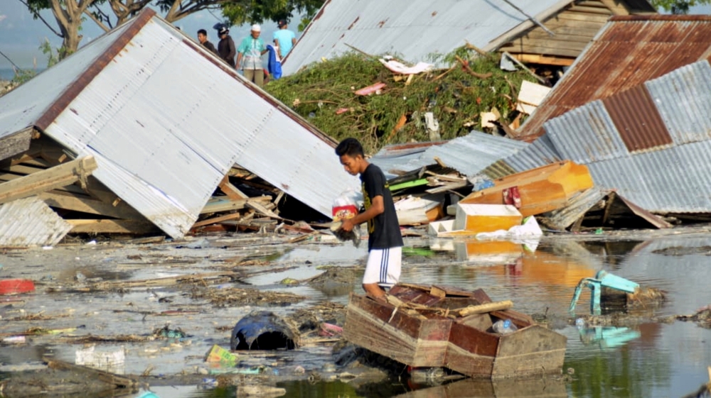  Disaster agency reported 'extensive' damage to buildings in Palu [Rifki/AP]