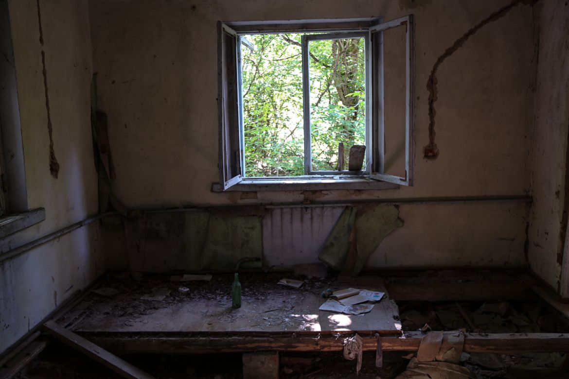 Looters who snuck into the Exclusion Zone eventually stole everything of value from deserted homes, going as far as ripping pipes from the floors and tearing wiring from walls. [Blake Sifton/Al Jazeer