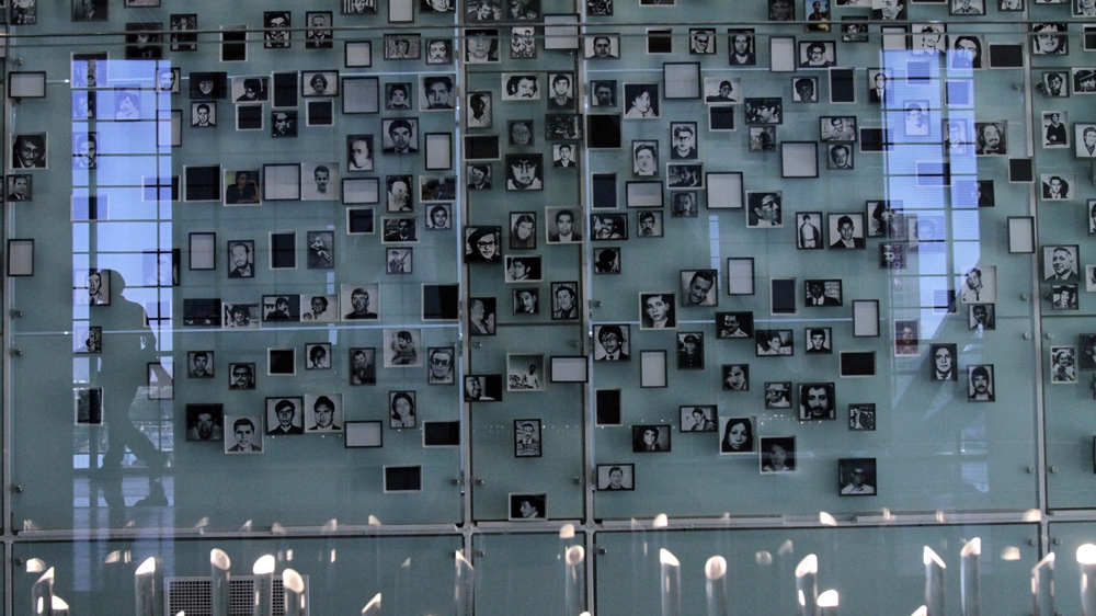 Portraits of some of the thousands who were murdered, tortured and disappeared [Victor Ruiz Caballero/Reuters]