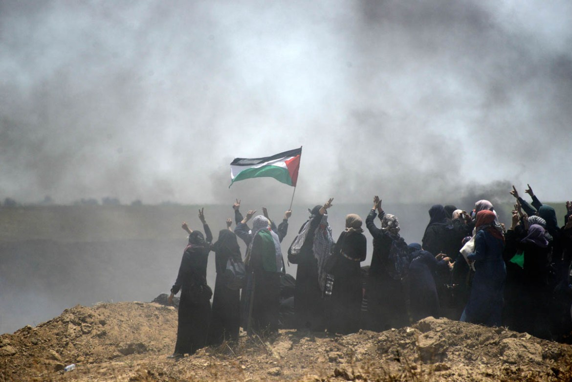 Palestinian women cheering during a large-scale demonstration for Nakba Day, May 14, 2018. Around 35,000 people participated in the demonstration that took place at 12 different locations inside the G