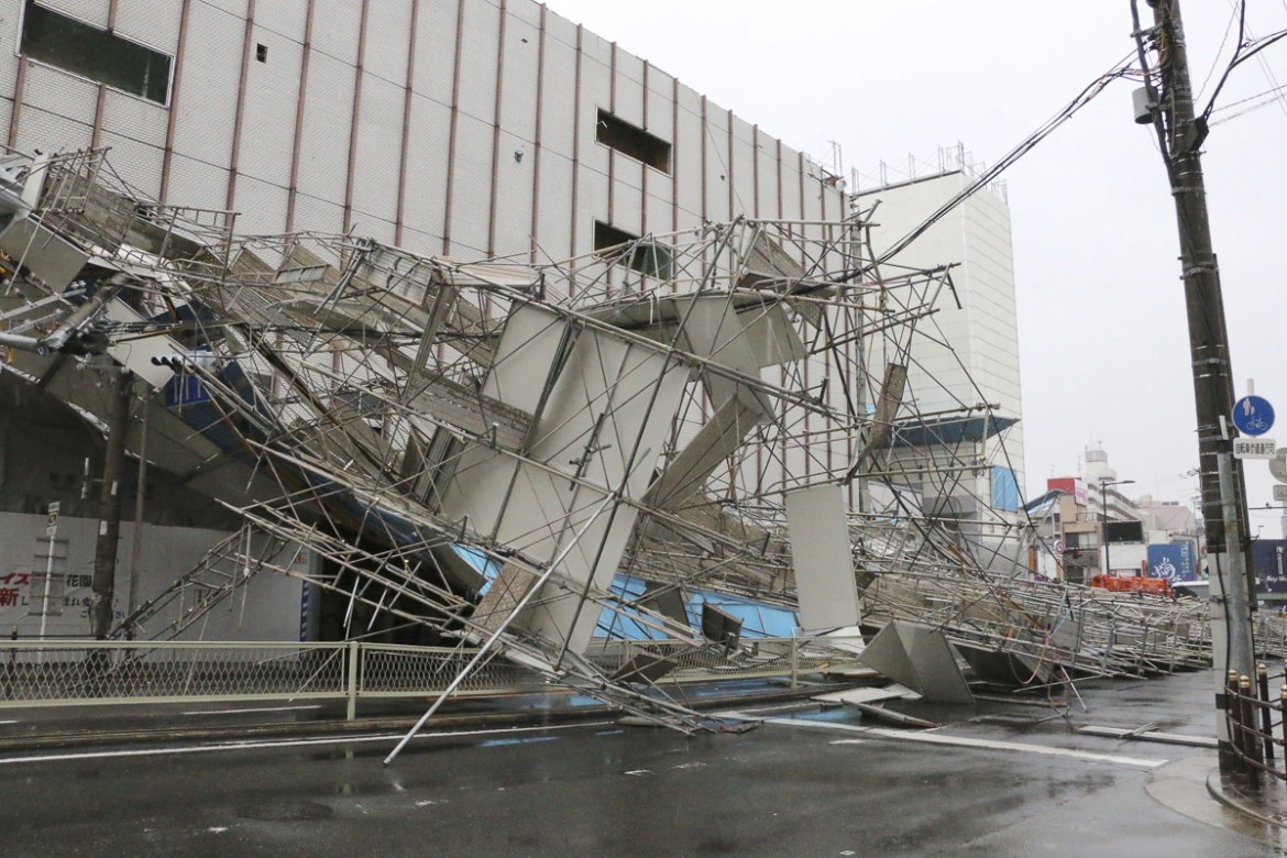 A building damaged by Typhoon Jebi is seen in Osaka, western Japan,†in this photo taken by Kyodo September 4, 2018. Mandatory credit Kyodo/via REUTERS ATTENTION EDITORS - THIS IMAGE WAS PROVIDED BY A