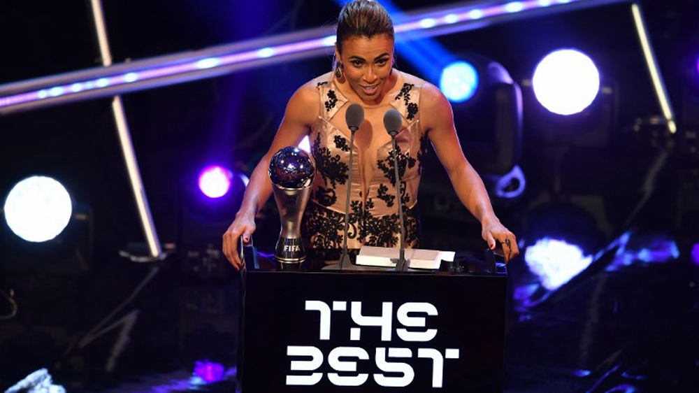 Marta receives her trophy for the Best FIFA Women's Player of 2018 Award [Ben Stansall/AFP]
