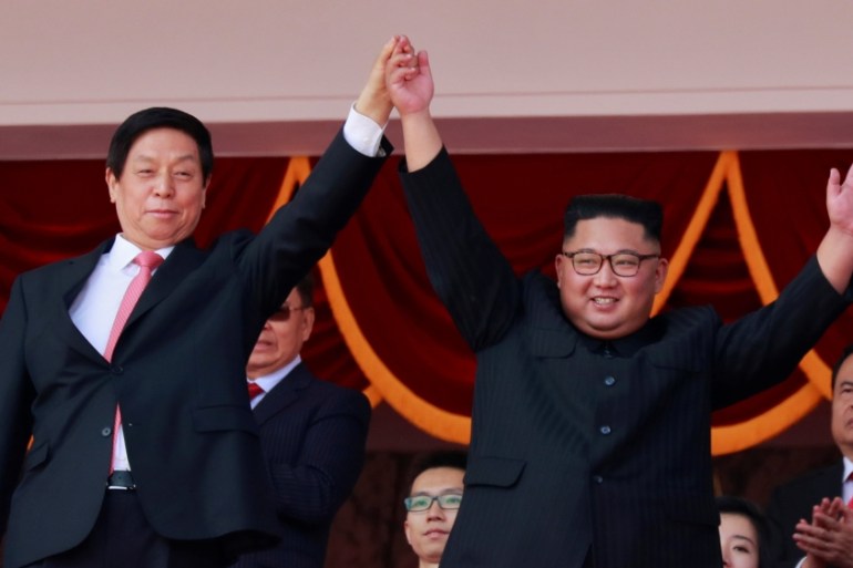 North Korean leader Kim Jong Un and China''s Li Zhanshu