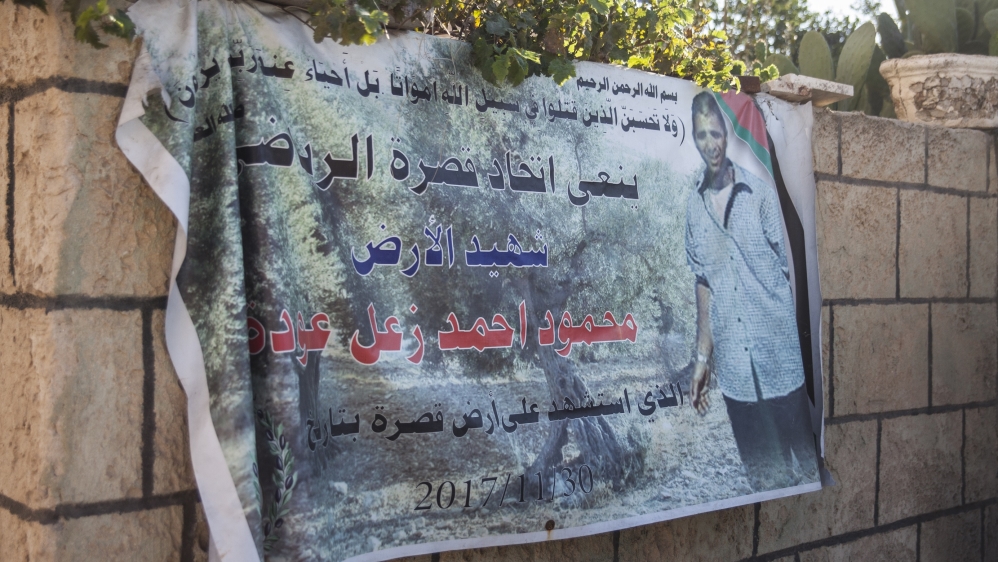 The entrance to Manal Shekadeh Abdel Raziq’s home in Qusra, in the north of the West Bank, eternalises the death of her husband, Mahmoud Ahmad Zaal Odeh [Tessa Fox/Al Jazeera]