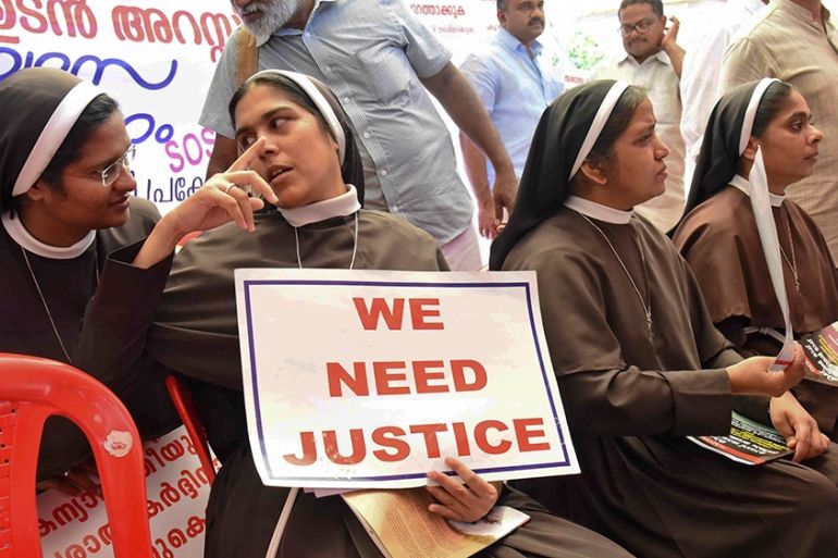 Catholic nuns hold placards demanding the arrest of a bishop who one nun has accused of rape, during a public protest in Kochi, Kerala, India, Wednesday, Sept. 12, 2018. The protest that began last we