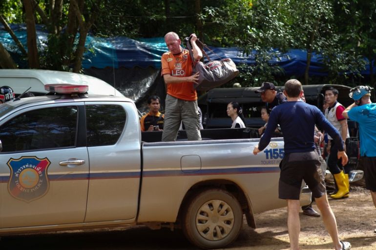 British caver Vernon Unsworth gets out of a pick up truck near the Tham Luang cave complex, where 12 boys and their soccer coach are trapped, in the northern province of Chiang Rai