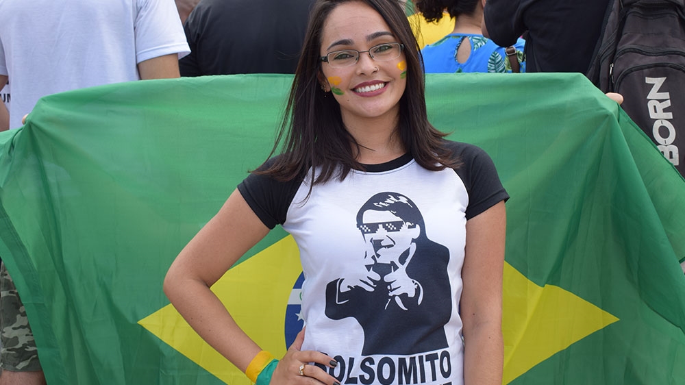 Thais Pena, pictured, a self-described Bolsonaro supporter and 'patriot' [David Child/Al Jazeera]