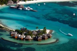 An aerial view shows a resort island at the Male Atoll December 7, 2009. Maldives has a population of some 400,000 islanders, whose livelihood from fishing and tourism is being hit by climate change.