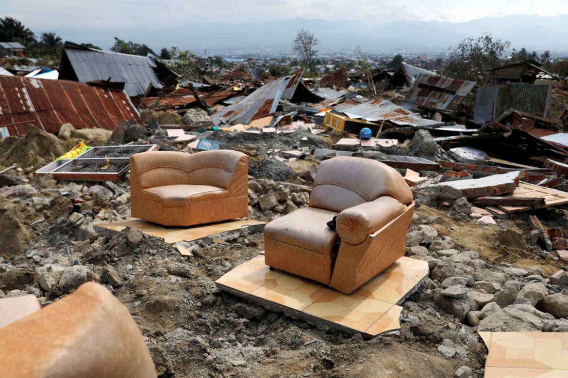 A sofa is seen among the ruins of a house after an earthquake hit Balaroa sub-district in Palu, Indonesia, October 4, 2018. REUTERS/Beawiharta TPX IMAGES OF THE DAY