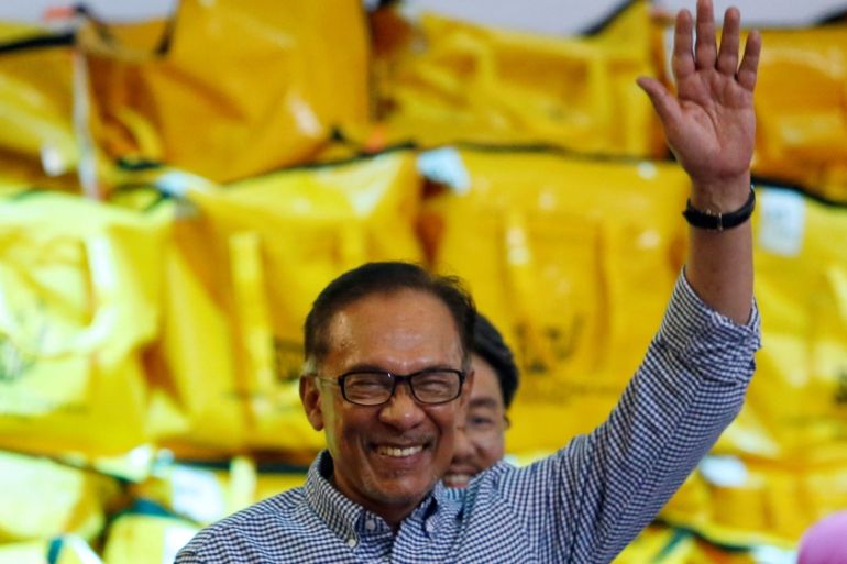 Malaysia''s politician Anwar Ibrahim celebrates after winning the by-election in Port Dickson
