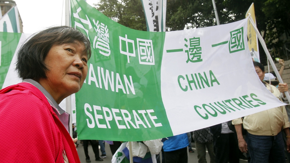 Taiwan has its own judiciary, political system, as well as its own currency [AP Photo/Chiang Ying-ying]