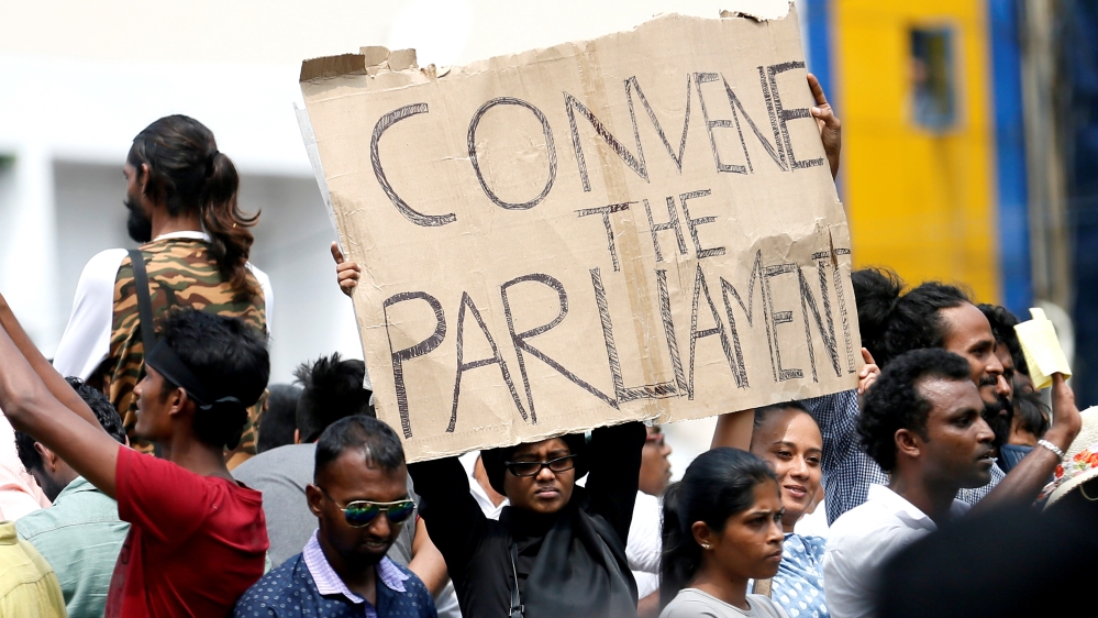 
All eyes are on legislators as two prime ministers claim legitimacy [Dinuka Liyanawatte/Reuters]
