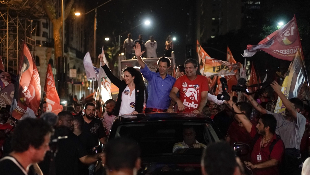 Fernando Haddad, presidential candidate for the Workers Party, campaigns in downtown Rio de Janeiro [File: Leo Correa/AP Photo] 