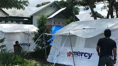 MERCY Malaysia field hospital near a damaged clinic in earthquake-hit central Sulawesi [MERCY Malaysia]