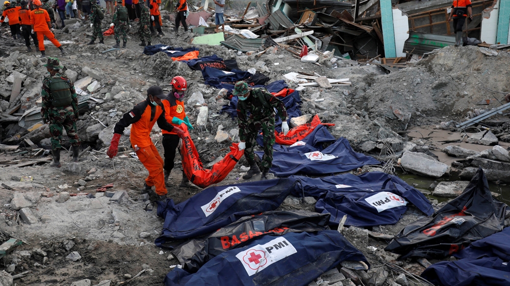 Rescue efforts have ended but the search for remains continues [Darren Whiteside/Reuters]