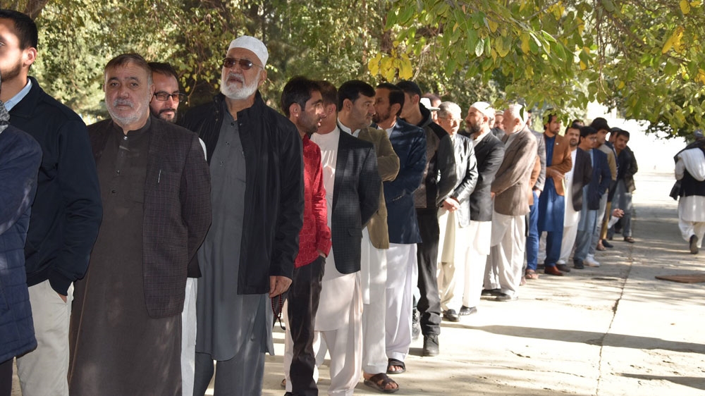The Independent Election Commission says 8.9 million Afghans are registered to vote in election [Hamza Mohamed/Al Jazeera]