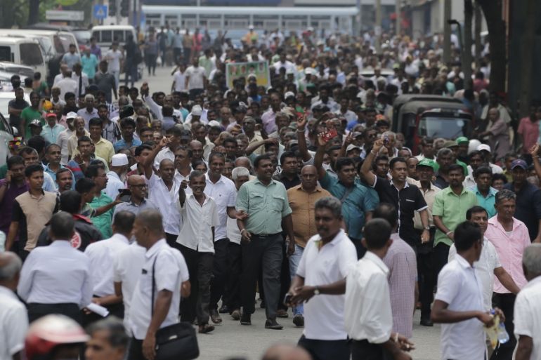 Supporters of Sri Lanka''s sacked prime minister Ranil Wickremesinghe shout slogans denouncing president Maithripala Sirisena