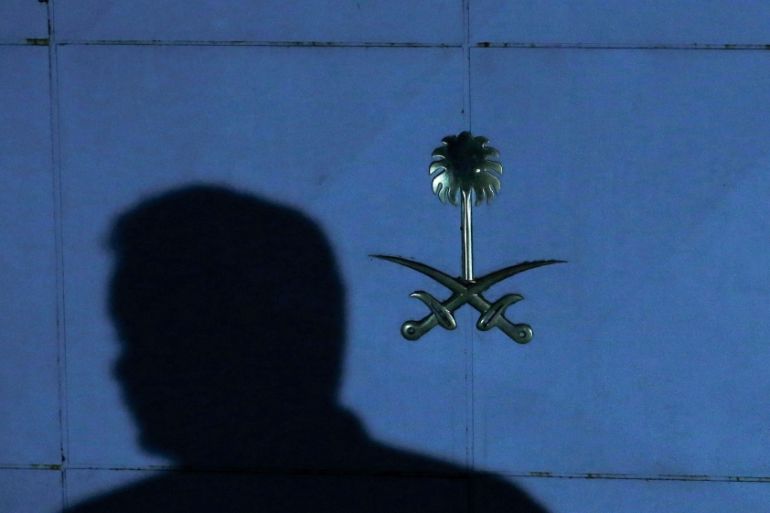 Members of security staff cast shadows at the entrance of the Saudi Arabia''s consulate in Istanbul [Huseyin Aldemir/Reuters]