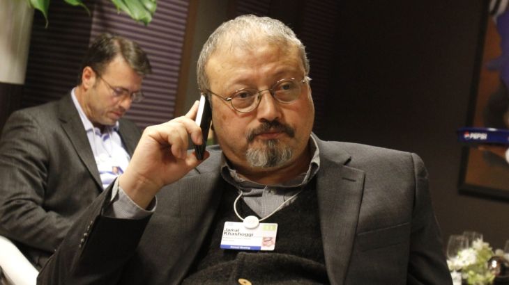 Saudi Arabian journalist Jamal Khashoggi speaks on his cellphone at the World Economic Forum in Davos, Switzerland on Saturday, Jan. 29, 2011. More than two dozen senior officials from key economies w