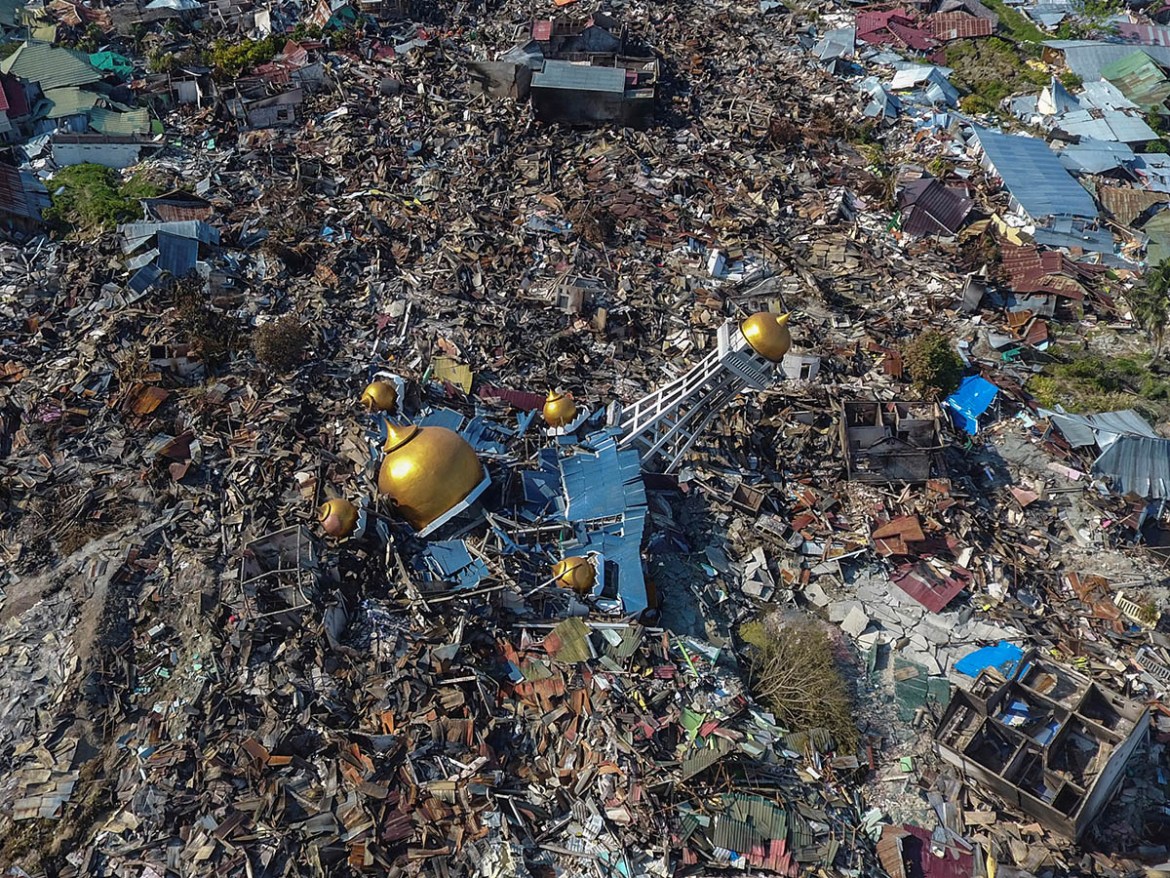An aerial view of an area devestated by an earthquake in Palu, Central Sulawesi, Indonesia October 1, 2018 in this photo taken by Antara Foto. Antara Foto/ Hafidz Mubarak A/ via REUTERS ATTENTION EDIT