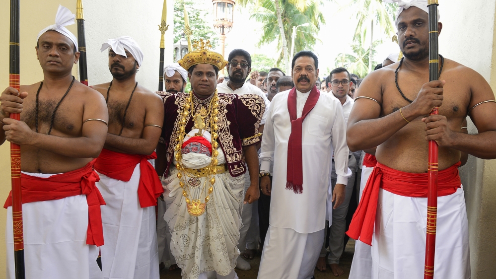Mahinda Rajapaksa (right) ended Sri Lanka's decades-long war against Tamil separatists [Lakruwan Wanniarachchi/AFP]