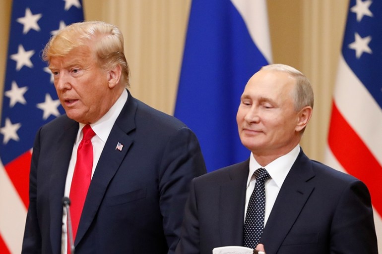 U.S. President Donald Trump and Russian President Vladimir Putin arrive for a joint news conference after their meeting in Helsinki, July 16, 2018. [Grigory Dukor/Reuters]