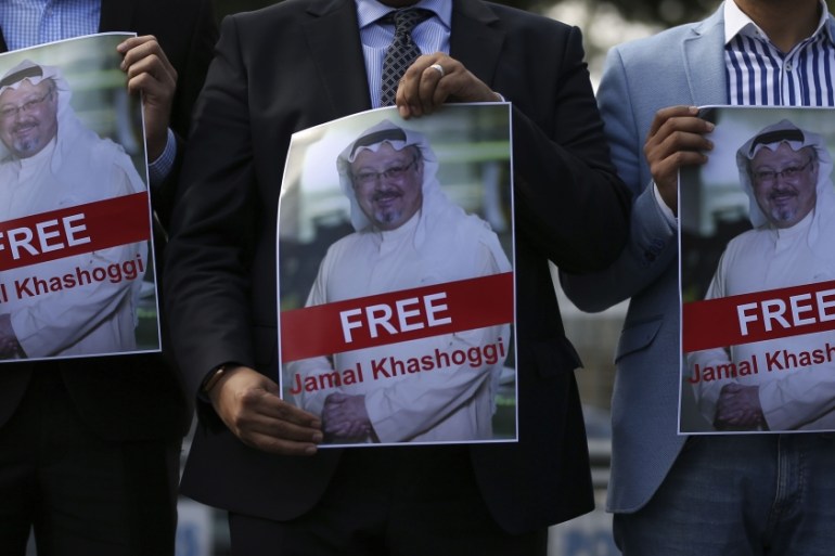 Holding pictures of missing Saudi writer Jamal Khashoggi, people gather in his support, near the Saudi Arabia consulate in Istanbul, Friday, Oct. 5, 2018. Khashoggi, a 59-year-old veteran journalist w