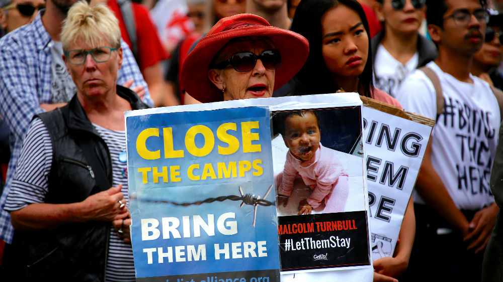 A rally against the treatment of asylum seekers in offshore detention centres in Nauru and Manus Island in Sydney in 2017 [David Gray/Reuters] 